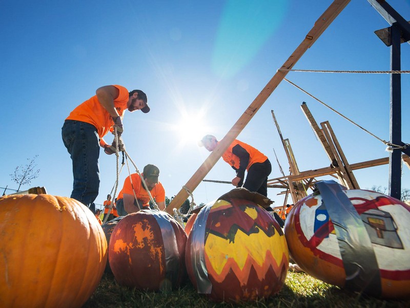 USU American Society of Mechanical Engineers preparing their pumpkins to toss.