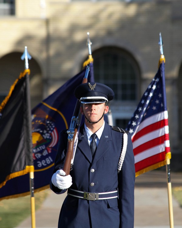 A member of the USU Air Force ROTC standing at the center of the Quad.