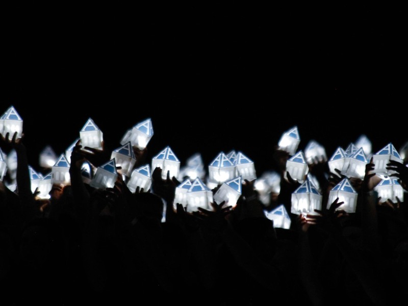 The USU Connections Luminary lanterns lit up.