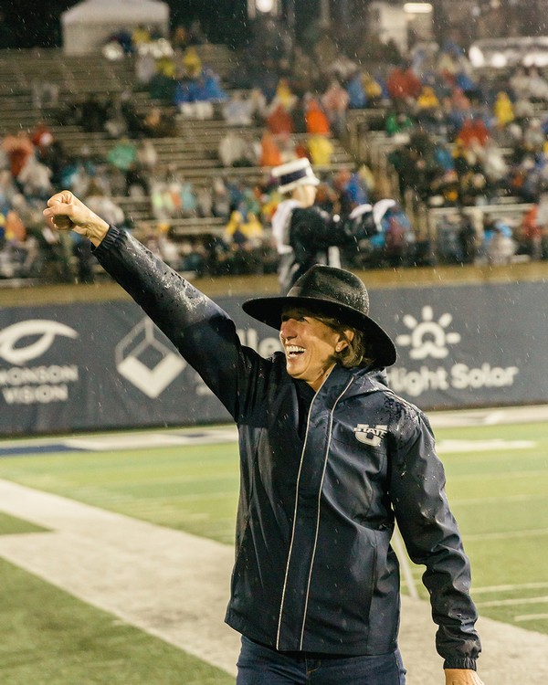 President Cockett Cheering at Homecoming Game