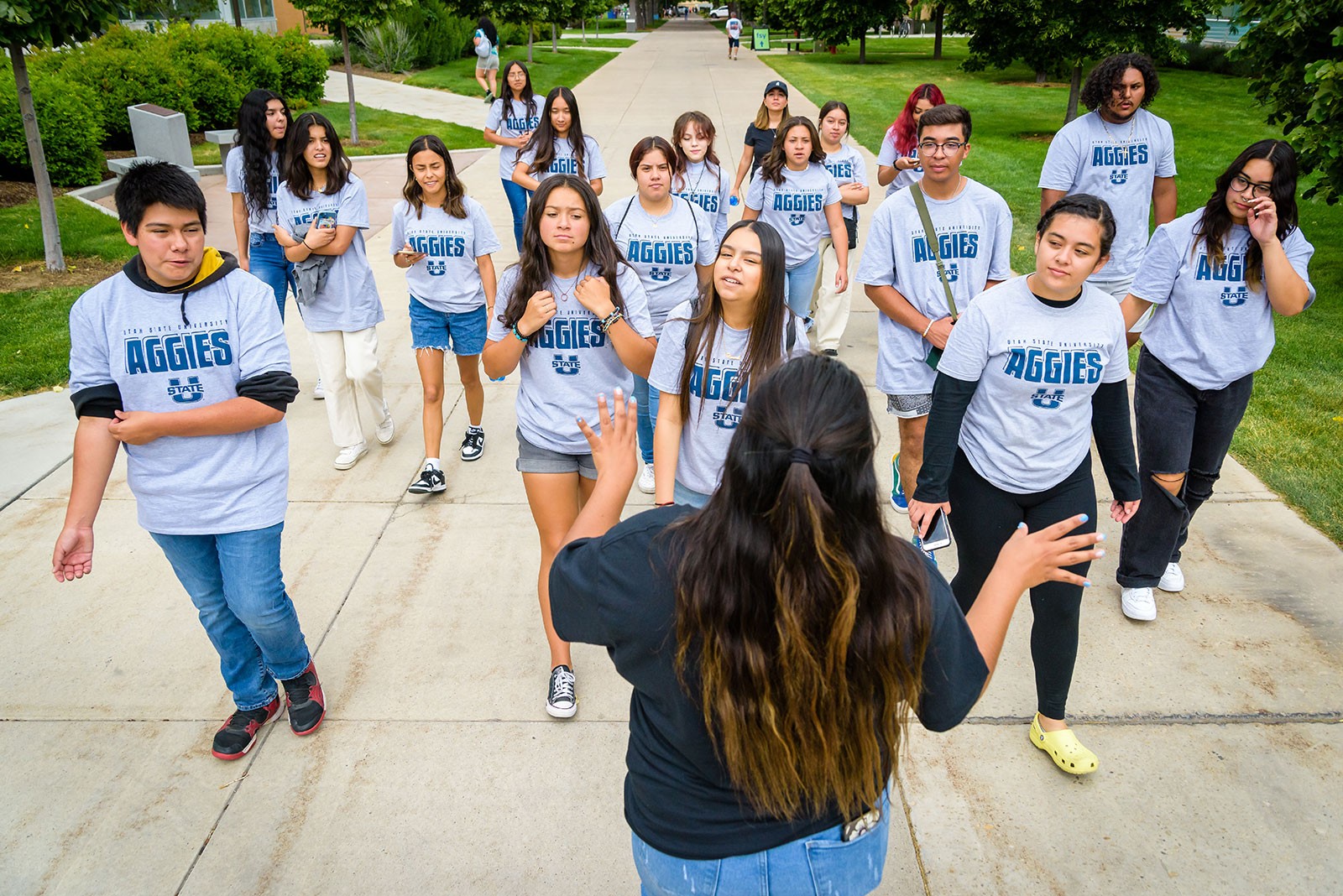 A group of high school students takes a tour of USU's Logan campus.