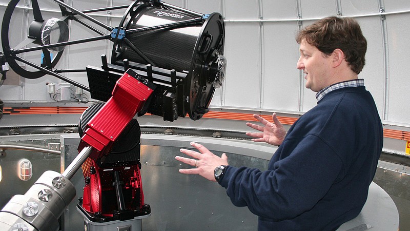 James Coburn demonstrates USU’s 20-inch reflecting telescope